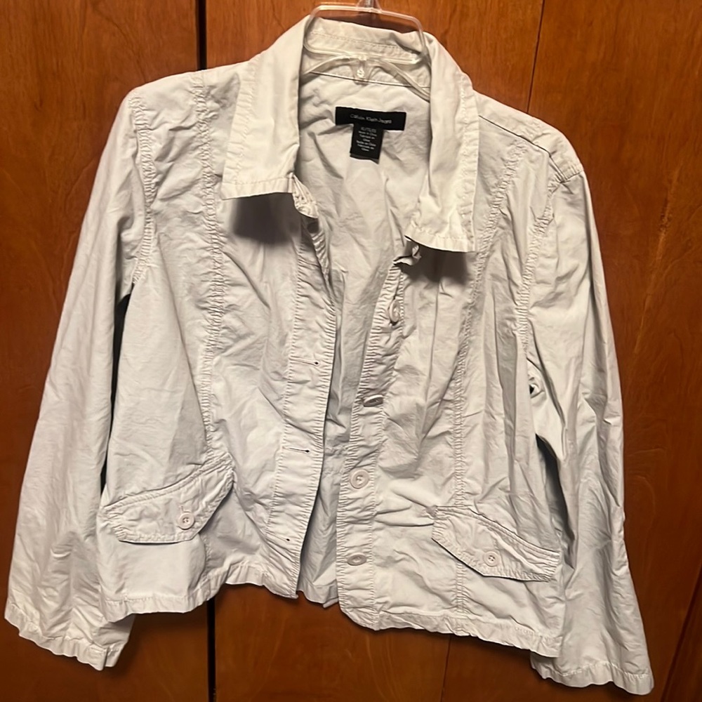Nice Calvin Klein Jeans khaki colored button up jacket.